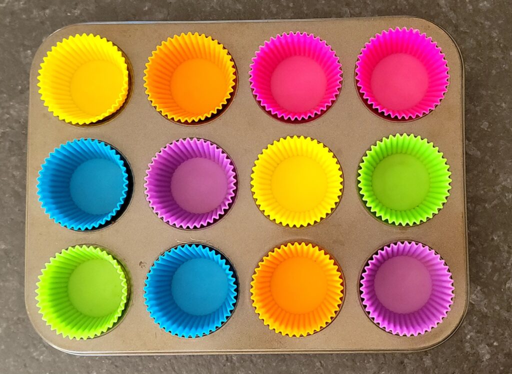 Cupcake liners in a muffin tin.