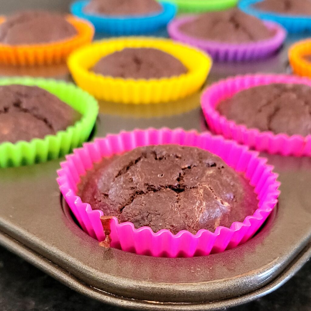 Cooked healthy chocolate muffins out of the oven.